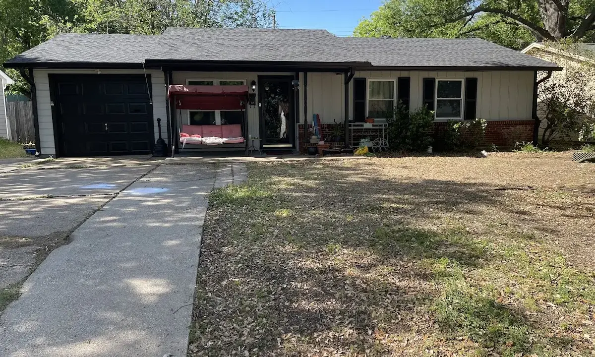 Asphalt Shingle Roof Repair crew at work on a residential roof in Fort Worth